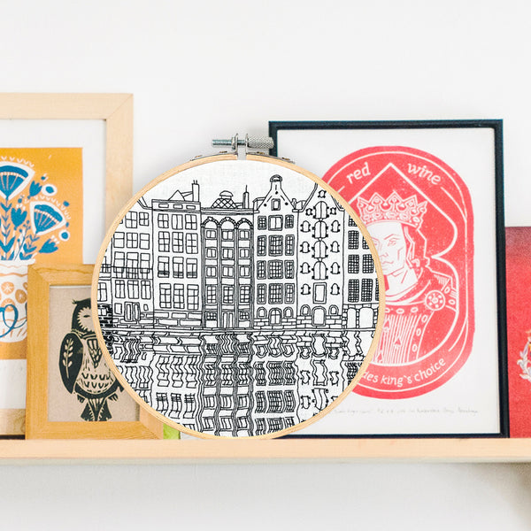 Load image into Gallery viewer, Gingerbread Housed Damrak Amsterdam Embroidery Hoop Art Displayed on a Shelf - Scandinavian Style

