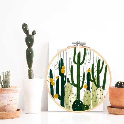 cactus bloom floral wall art embroidery hoop displayed on a shelf